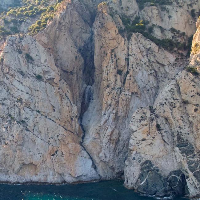 Kremastos Waterfall. The largest waterfall in the world that flows directly into the sea.